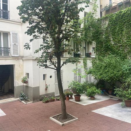 Tres Bel Appartement Montmartre ปารีส ภายนอก รูปภาพ