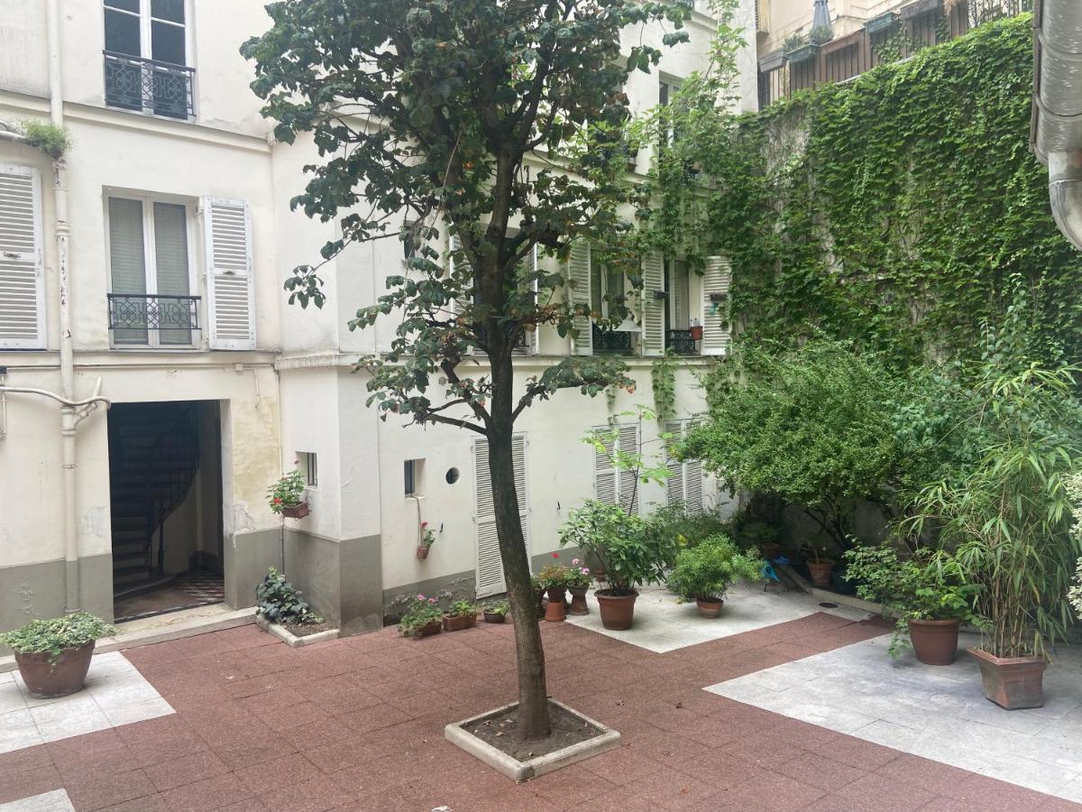 Tres Bel Appartement Montmartre ปารีส ภายนอก รูปภาพ
